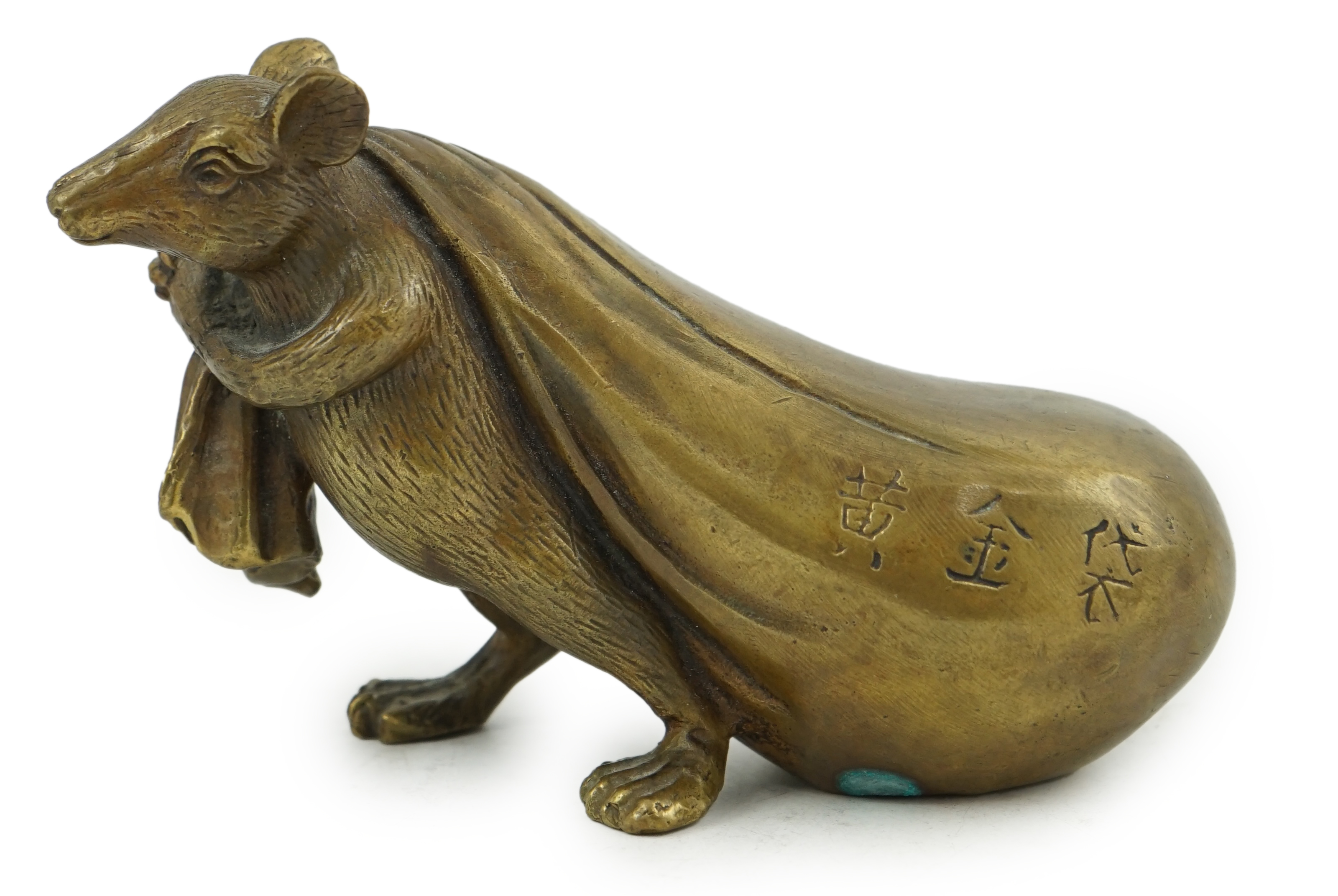 A Chinese bronze rat carrying a sack, signed in casting, 14cm long. Condition - fair